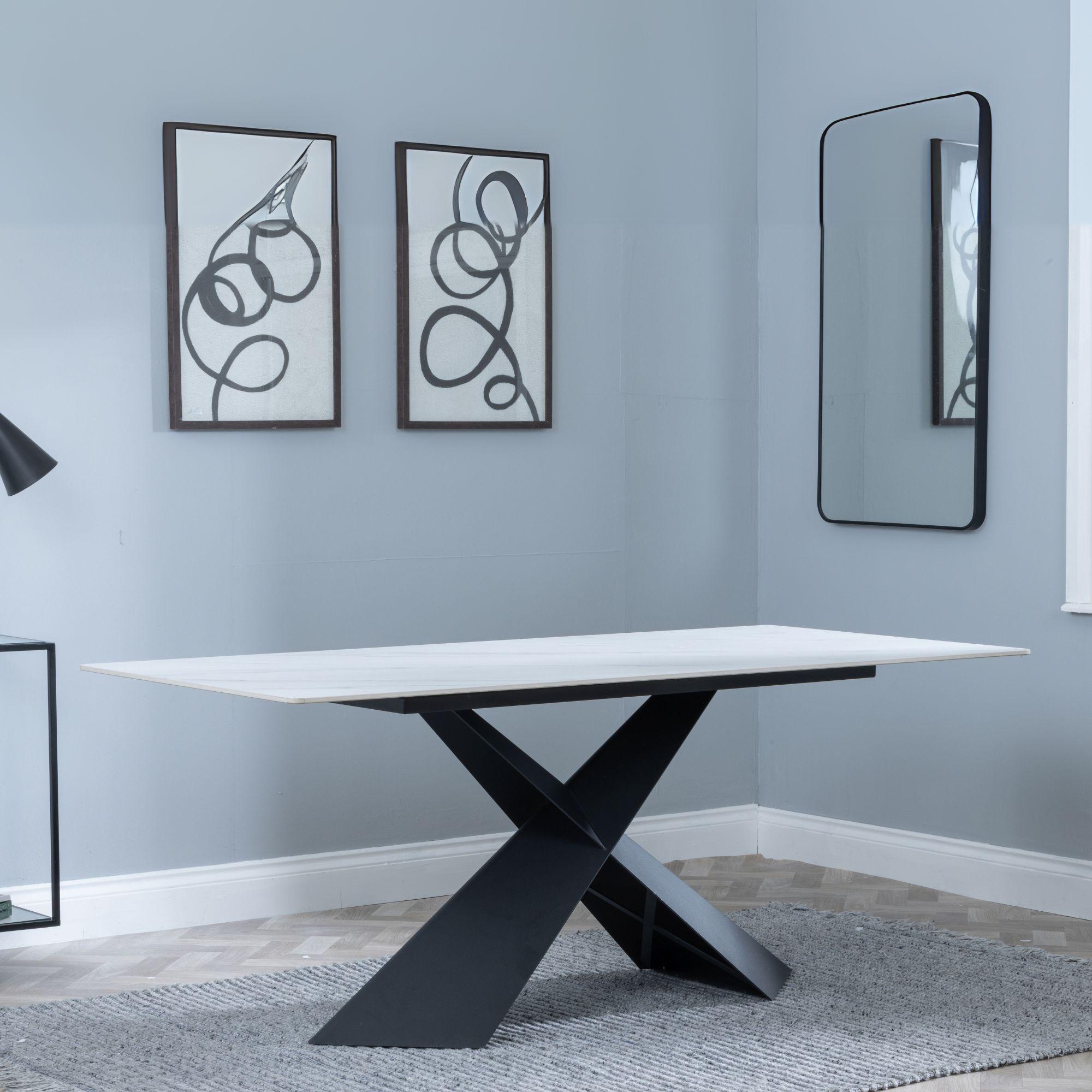 Product photograph of Merlin 180cm White Ceramic Dining Table With Black Cross Base from Choice Furniture Superstore.