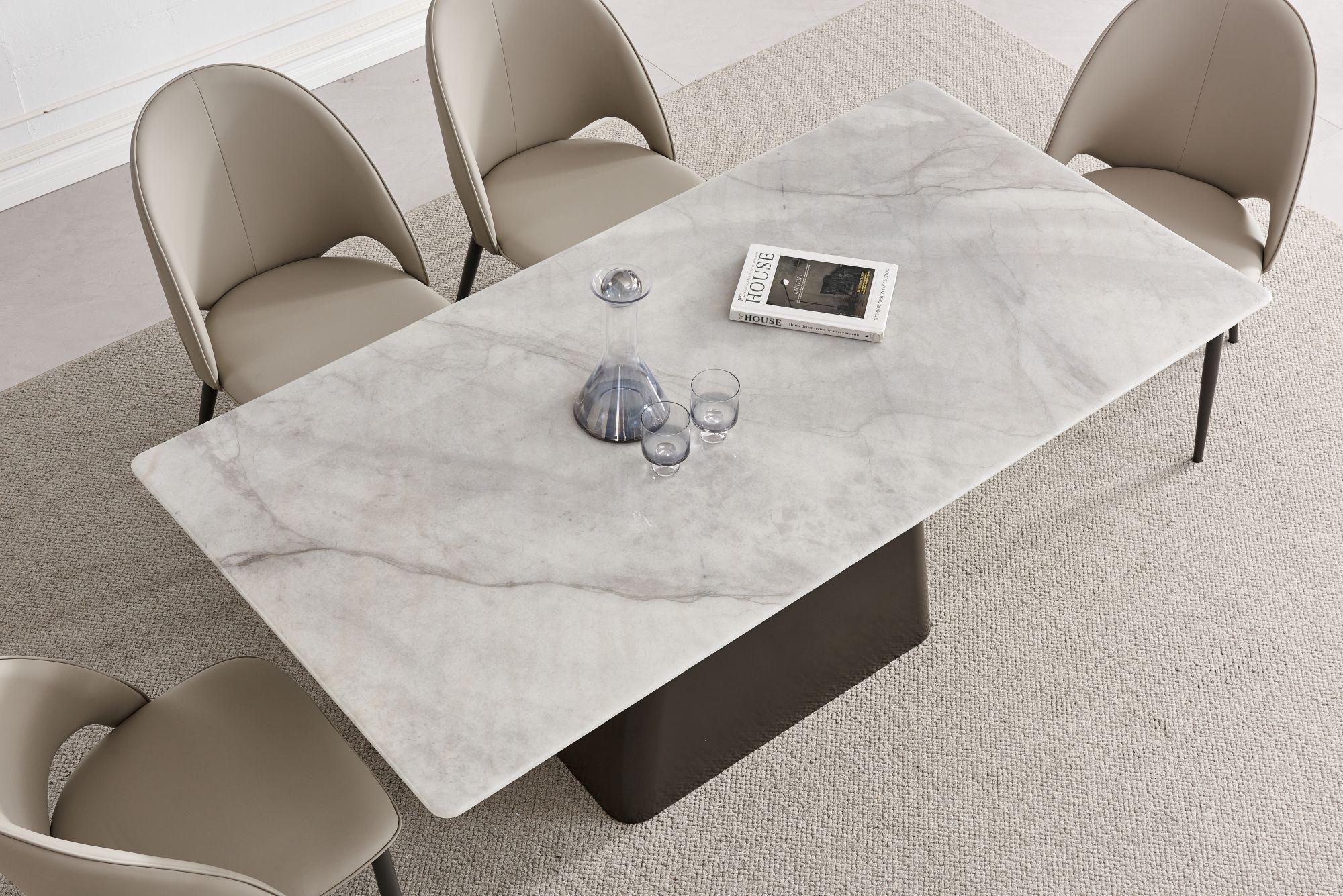 Product photograph of Ancora Marble Dining Table - Displayed In Ocean from Choice Furniture Superstore.