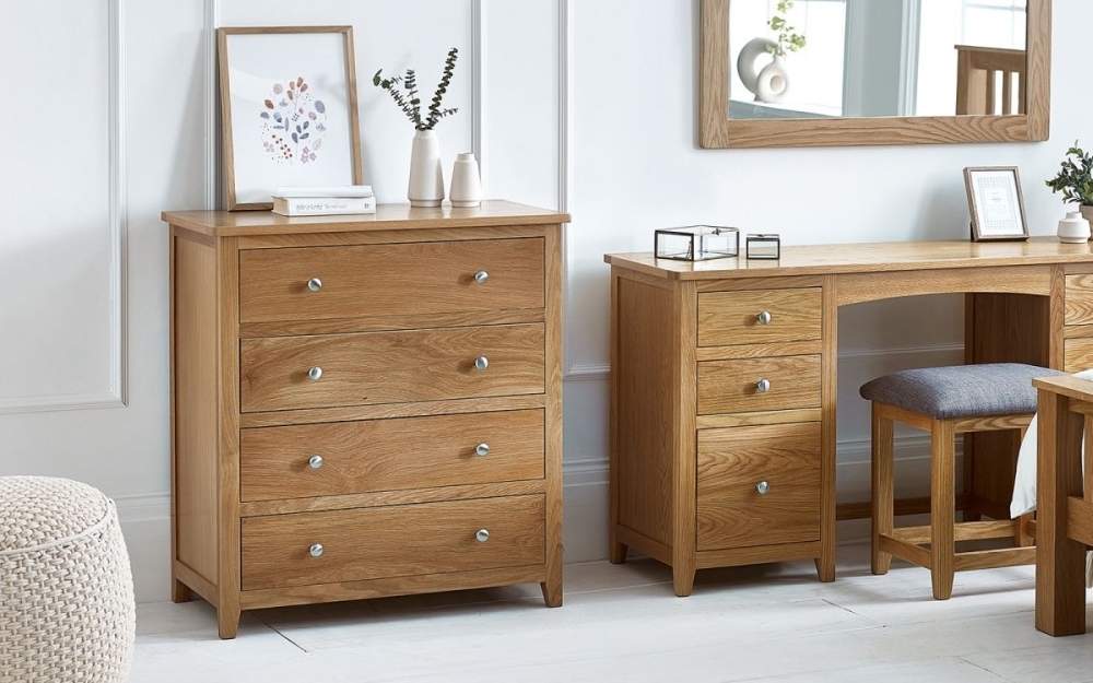 Product photograph of Mallory Oak 4 Drawer Chest from Choice Furniture Superstore.