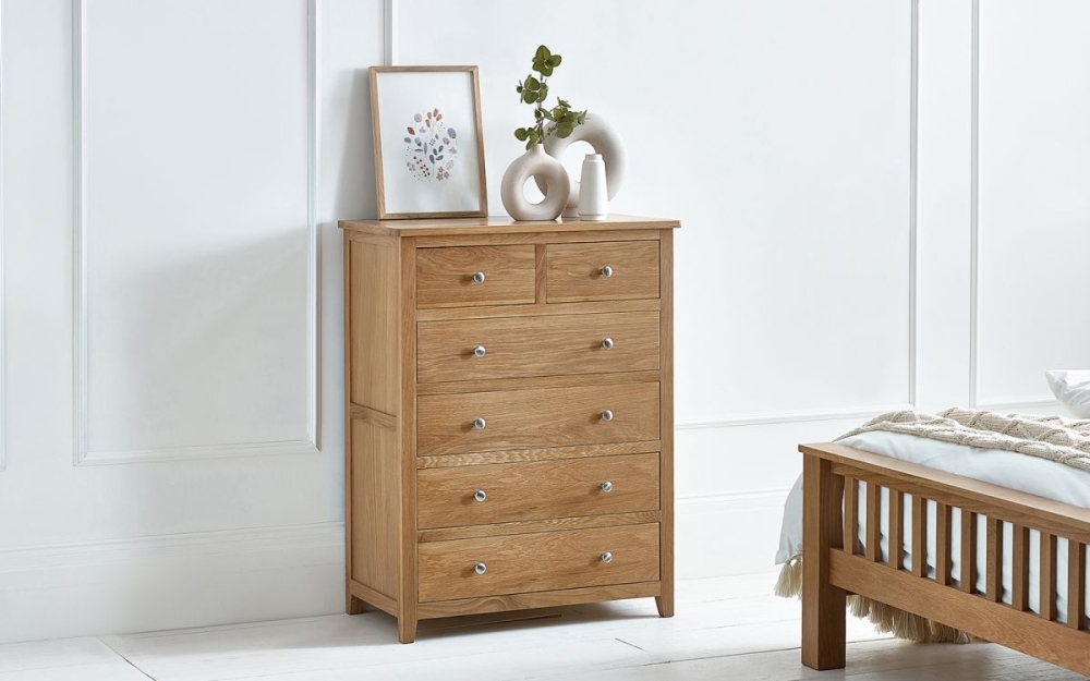 Product photograph of Mallory Oak 4 2 Drawer Chest from Choice Furniture Superstore.