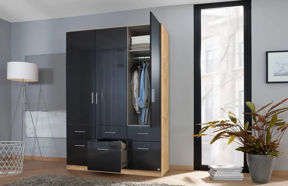 Product photograph of Rauch Celle 3 Door Charcoal Black And Oak Combi Wardrobe - 136cm from Choice Furniture Superstore.