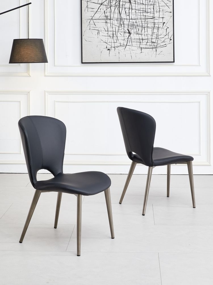 Product photograph of Clooney Black Dining Chair - Faux Leather With Black Legs from Choice Furniture Superstore.