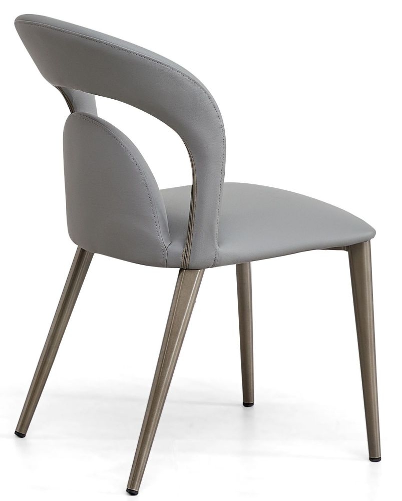 Product photograph of Dixie Grey Dining Chair- Faux Leather With Black Legs from Choice Furniture Superstore.