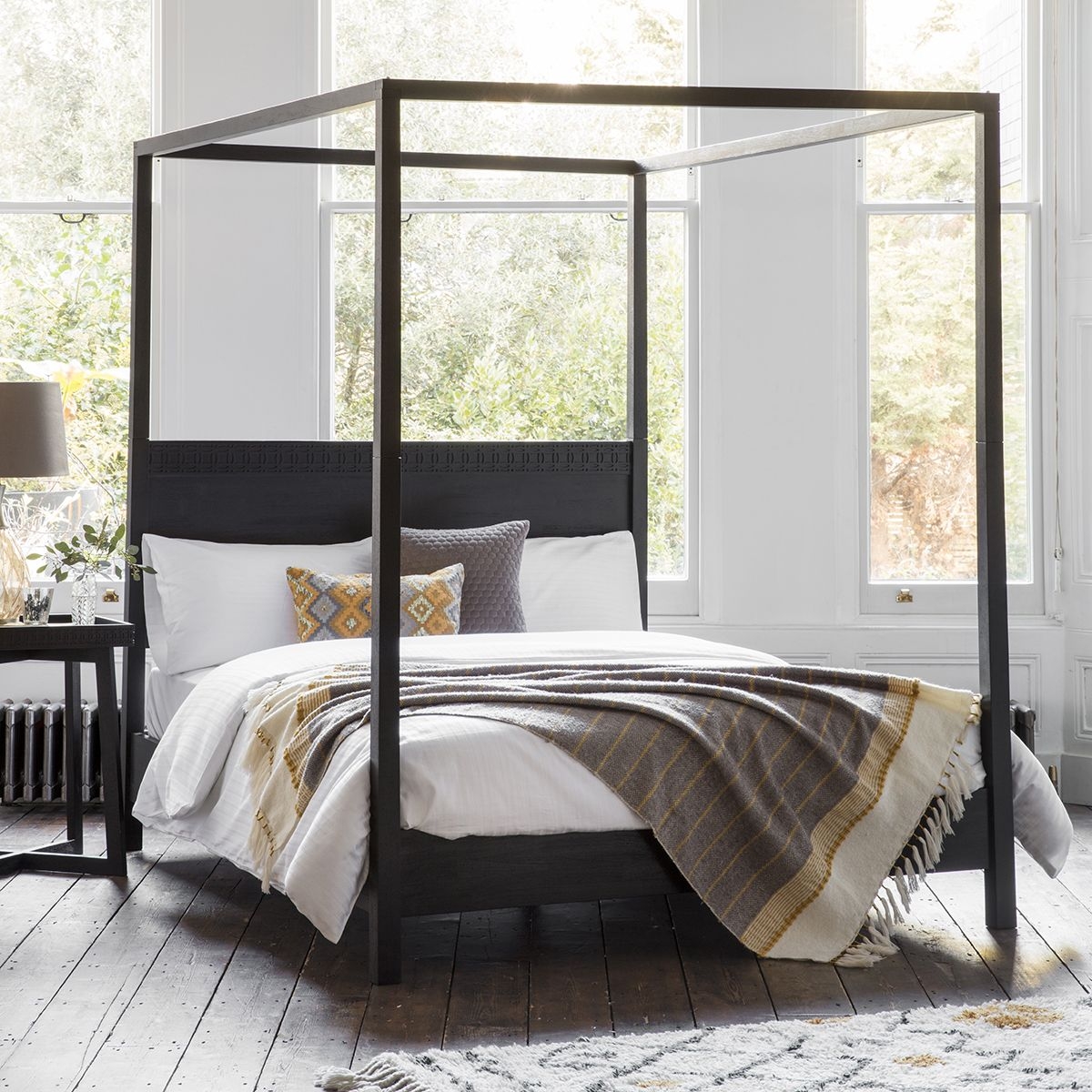 Product photograph of Boho Boutique Black Mango Wood 4 Poster Bed - Comes In King And Queen Size from Choice Furniture Superstore.