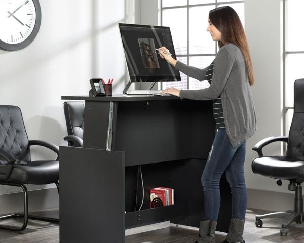 Product photograph of Teknik Vertex Sit Stand Bourbon Oak Desk from Choice Furniture Superstore.