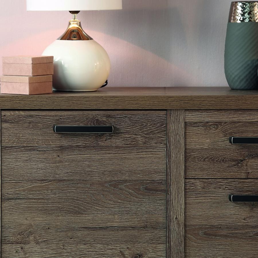 Product photograph of Corona Tabak Oak 4 Door 2 Drawer Sideboard from Choice Furniture Superstore.