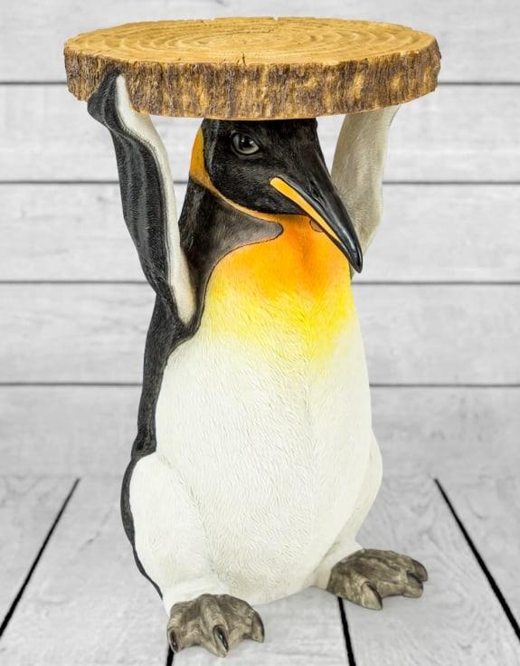 Product photograph of Penguin Holding Trunk Slice Side Table from Choice Furniture Superstore.