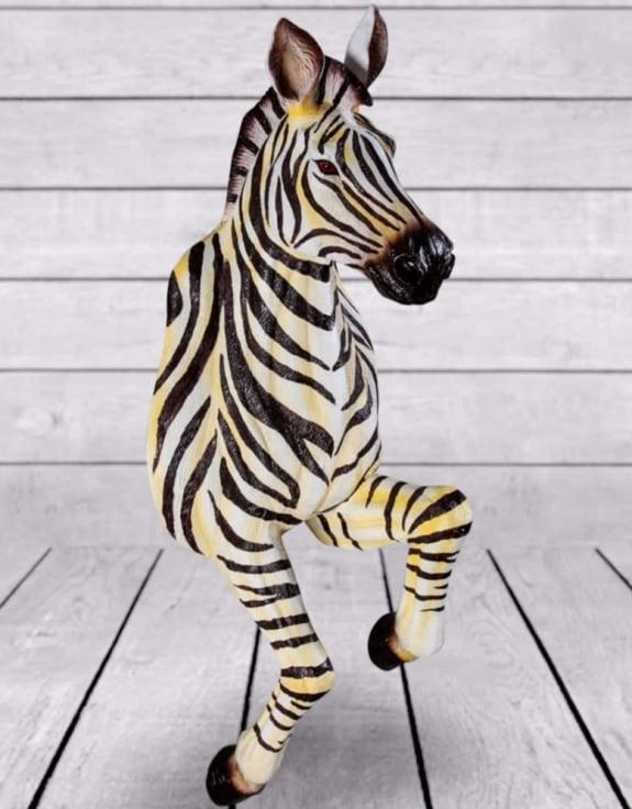 Product photograph of Running Zebra Wall Figure from Choice Furniture Superstore.