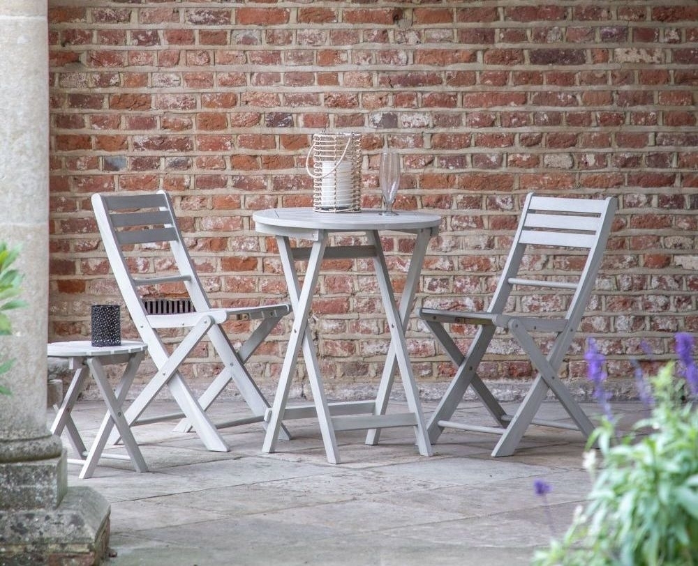Product photograph of Clearance - Barnet Whitewash 2 Seater Outdoor Garden Bistro Set - D515 from Choice Furniture Superstore.