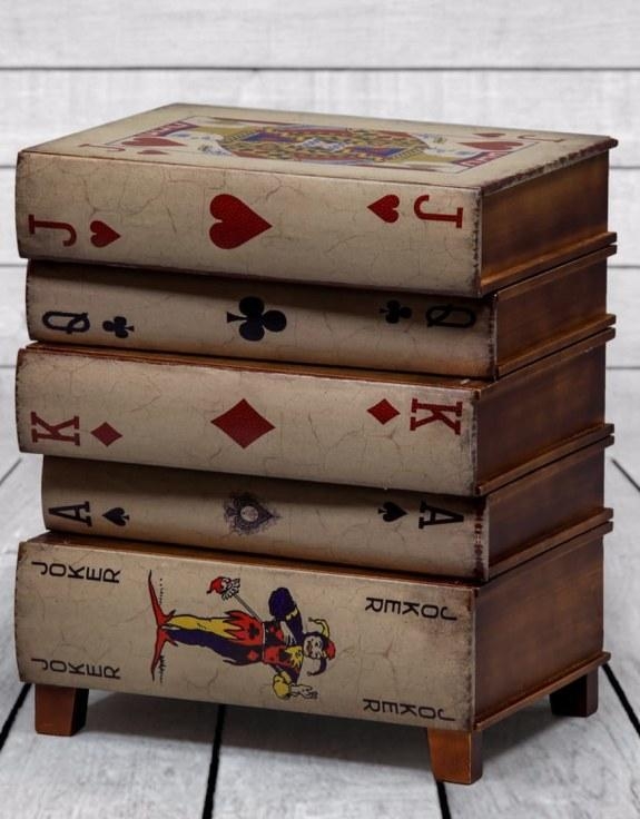 Product photograph of Antiqued Stacked Playing Card Books Side Cabinet from Choice Furniture Superstore.