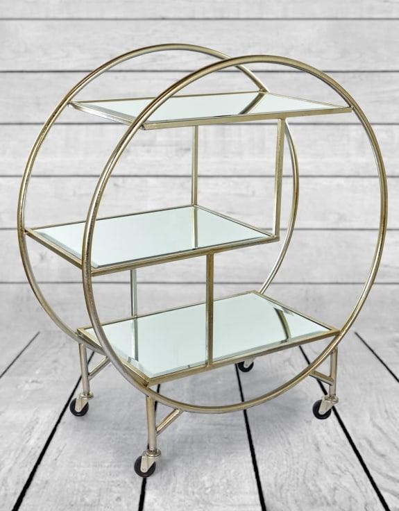 Product photograph of Antique Silver And Champagne Leaf Metal Bar Trolley With Mirror Shelves from Choice Furniture Superstore.