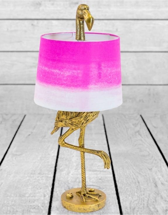 Product photograph of Antique Gold Flamingo Table Lamp With Pink And White Shade from Choice Furniture Superstore.