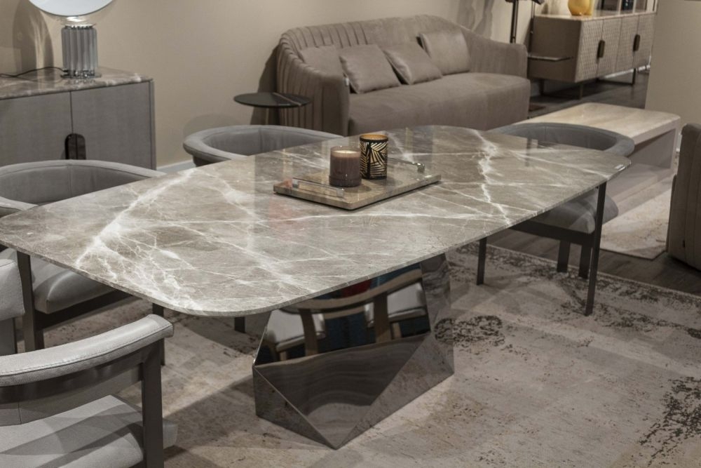 Product photograph of Stone International Maestro Marble Dining Table from Choice Furniture Superstore.