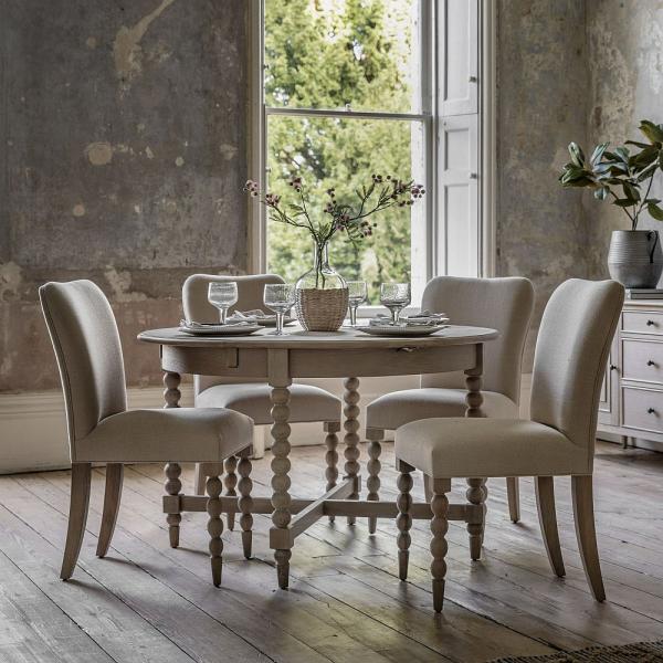 Product photograph of Artisan Oak Round Extending Dining Table With Bobbin Legs - 120cm-160cm from Choice Furniture Superstore.