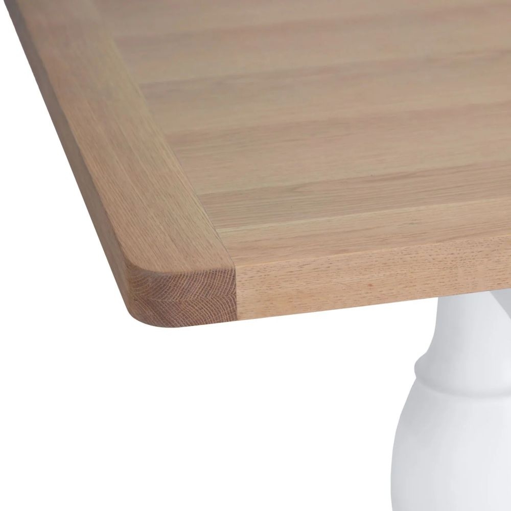 Product photograph of Clairton White 4-6 Seater Extending Dining Table With Pedestal Base - Oak Top from Choice Furniture Superstore.