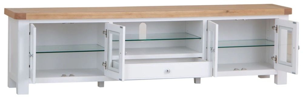 Product photograph of Clairton White 4 Door 1 Drawer Extra Large Tv Unit - Oak Top from Choice Furniture Superstore.