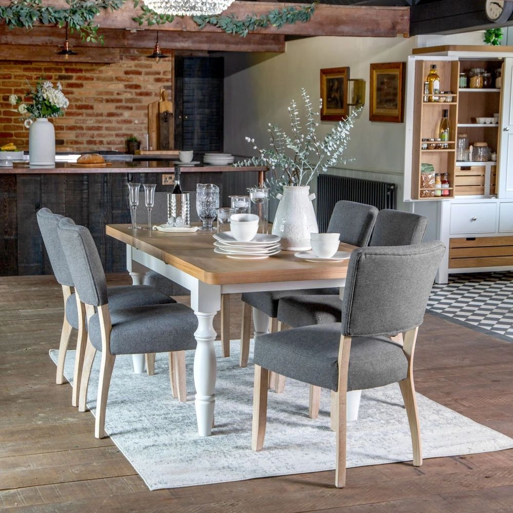 Product photograph of Clairton White 4-6 Seater Extending Dining Set With 6 Grey Fabric Chairs from Choice Furniture Superstore.