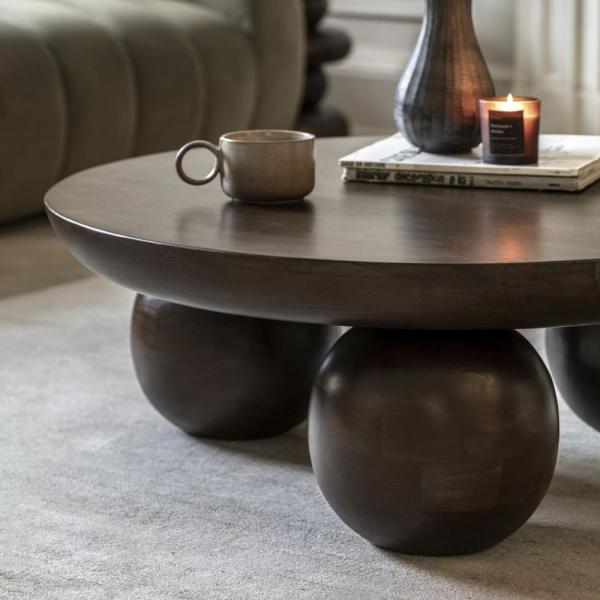 Product photograph of Sculpt Dark Mango Wood Round Coffee Table from Choice Furniture Superstore.