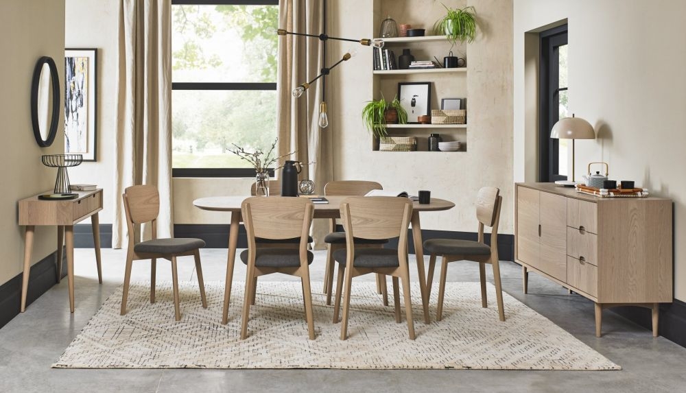 Product photograph of Bentley Designs Dansk Scandi Oak Veneer Cold Steel Fabric Back Dining Chair Sold In Pairs from Choice Furniture Superstore.