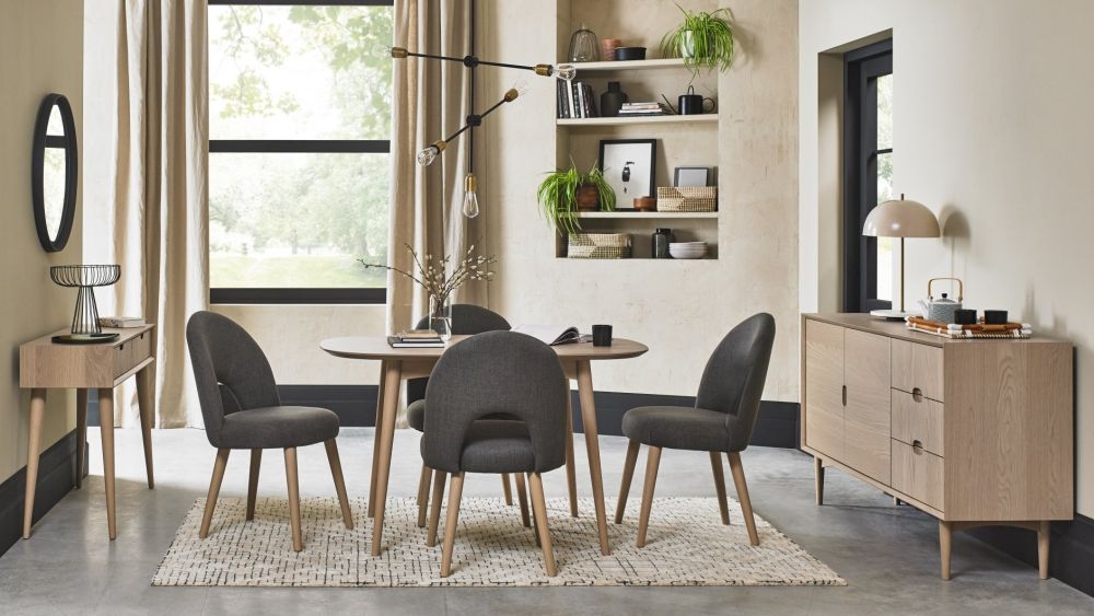 Product photograph of Bentley Designs Dansk Scandi Oak Upholstered Cold Steel Fabric Dining Chair Sold In Pairs from Choice Furniture Superstore.