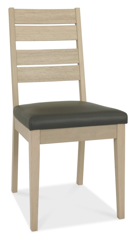 Product photograph of Bentley Designs Oakham Scandi Oak Dark Grey Bonded Leather Dining Chair Sold In Pairs from Choice Furniture Superstore.