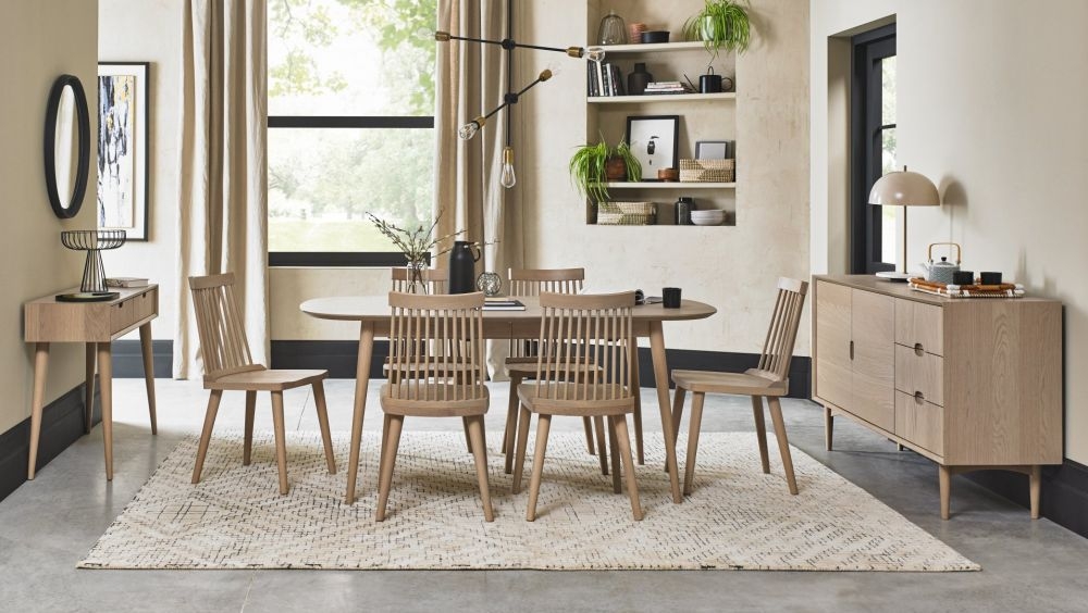 Product photograph of Bentley Designs Dansk Scandi Oak Dining Table Set With Ilva Scandi Oak Spindle Chairs from Choice Furniture Superstore.