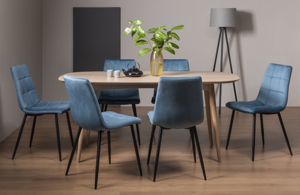 Product photograph of Bentley Designs Dansk Scandi Oak Dining Table Set With Eriksen Petrol Blue Velvet Chairs from Choice Furniture Superstore.