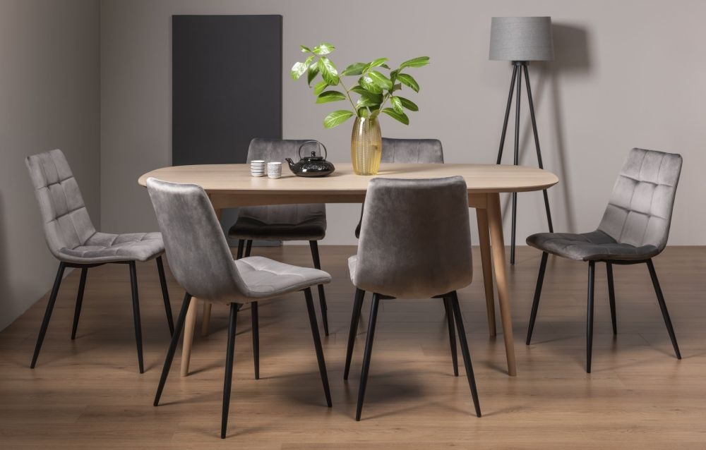 Product photograph of Bentley Designs Dansk Scandi Oak Dining Table Set With Mondrian Dark Grey Velvet Fabric Chairs from Choice Furniture Superstore.