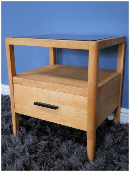 Product photograph of Dutch Rubber Wood And Black Glass 1 Drawer Bedside Cabinet from Choice Furniture Superstore.