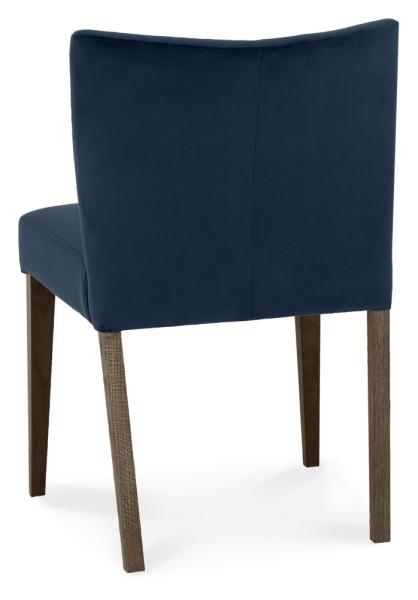 Product photograph of Bentley Designs Turin Dark Blue Velvet Fabric Low Back Dining Chair Sold In Pairs from Choice Furniture Superstore.