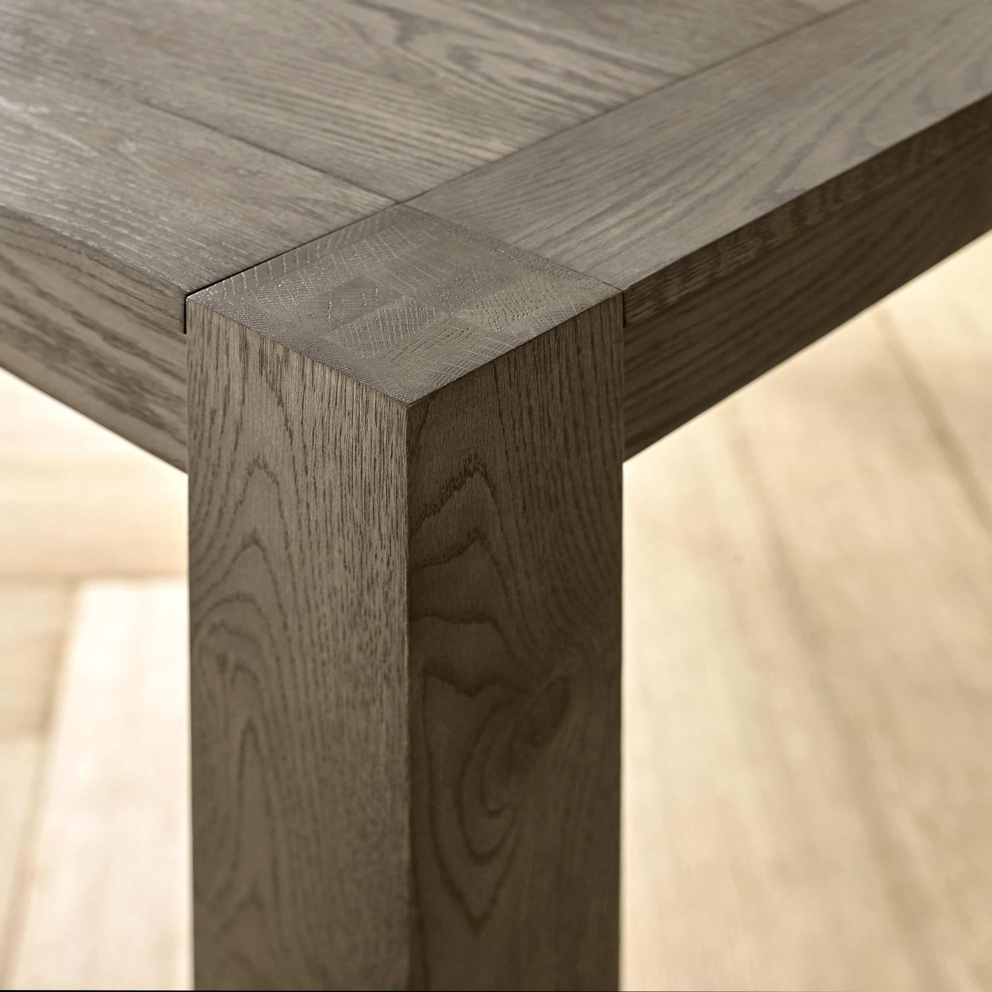 Product photograph of Bentley Designs Turin Dark Oak 6-10 Seater Extending Dining Table With 6 Lewis Distressed Dark Grey Fabric Cantilever Chairs from Choice Furniture Superstore.