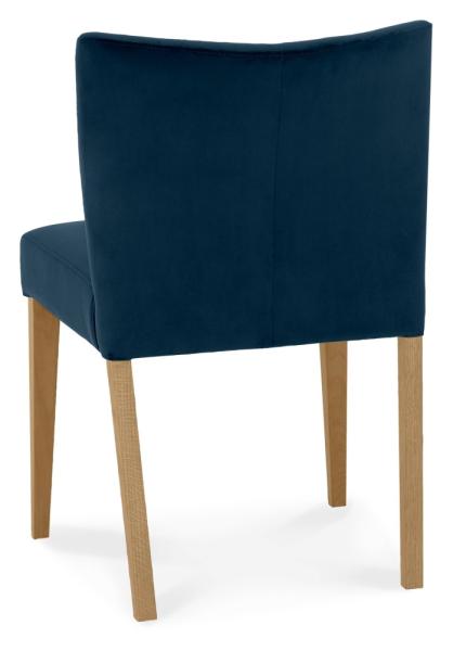 Product photograph of Bentley Designs Turin Light Oak Low Back Dark Blue Velvet Fabric Dining Chair Sold In Pairs from Choice Furniture Superstore.