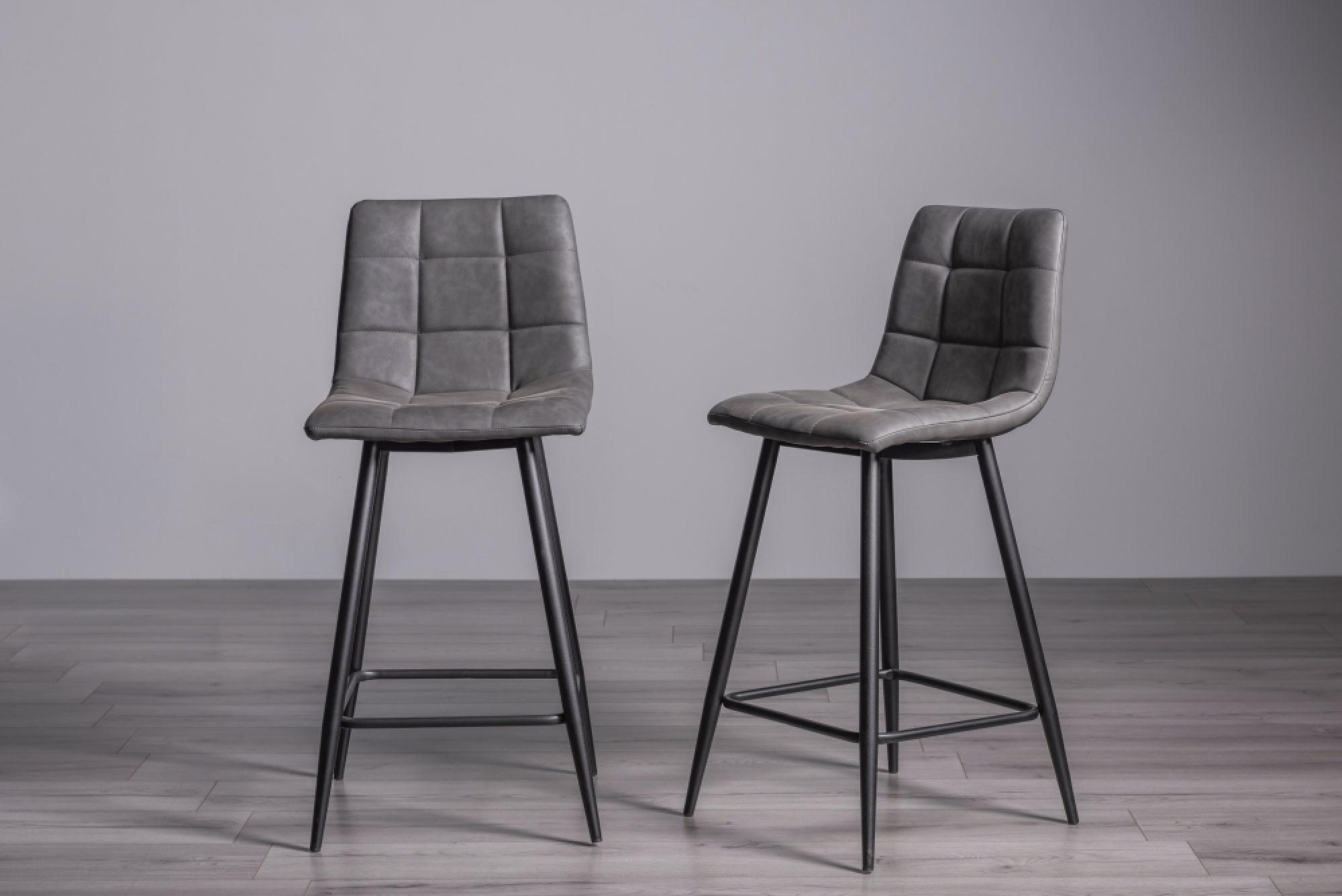 Product photograph of 2 X Bentley Designs Mondrian Dark Grey Faux Leather Barstool With Black Legs from Choice Furniture Superstore.