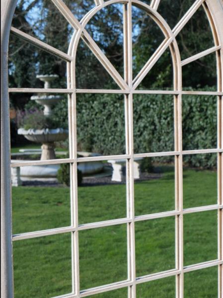 Product photograph of Rustic Cream Arch Garden Mirror from Choice Furniture Superstore.