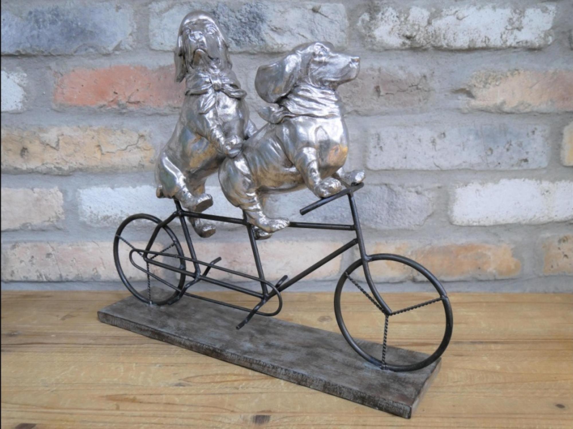 Product photograph of Resin And Metal Dogs On A Bicycle - Set Of 2 from Choice Furniture Superstore.