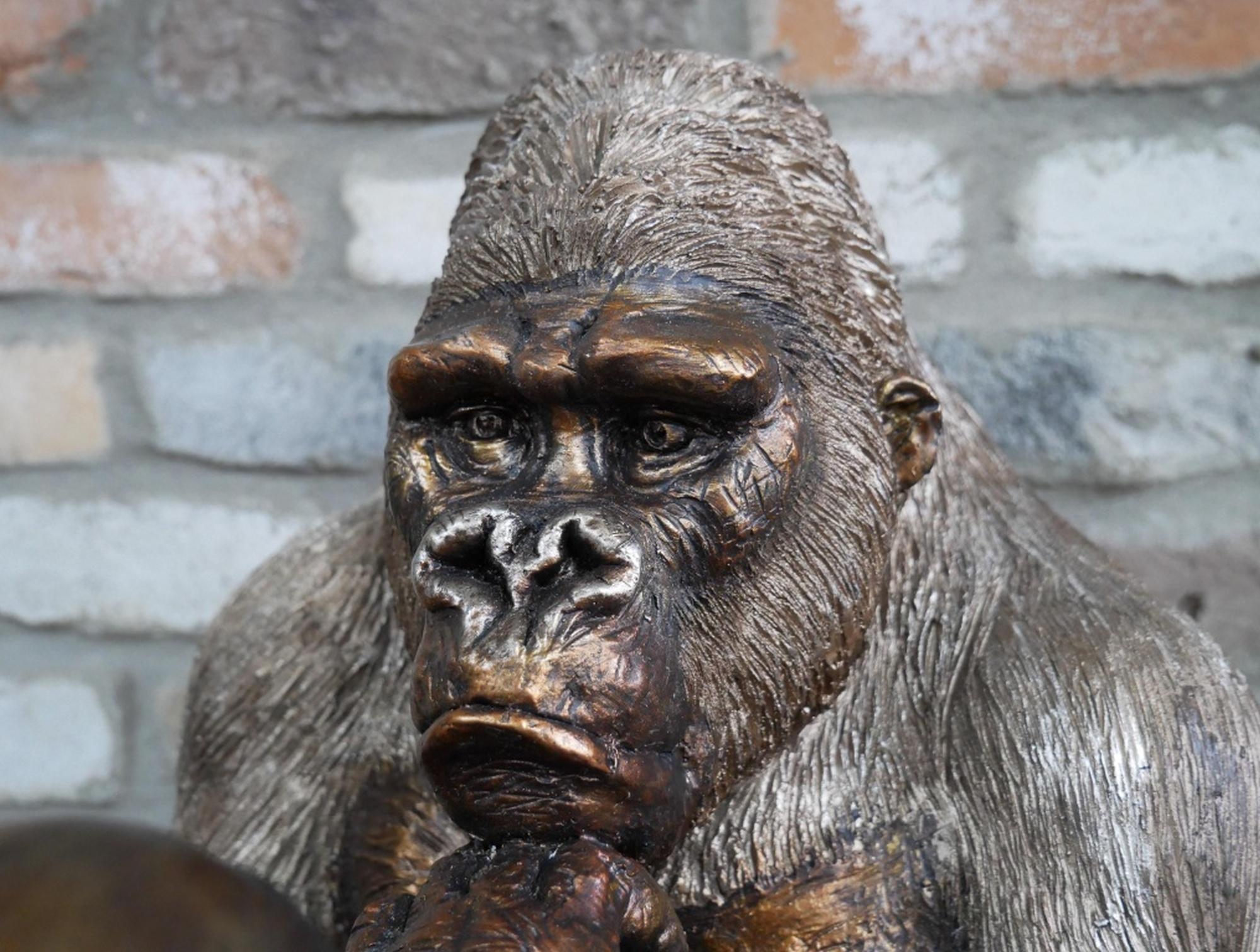 Product photograph of Large Gorilla Statue Holding Skull Ornament from Choice Furniture Superstore.