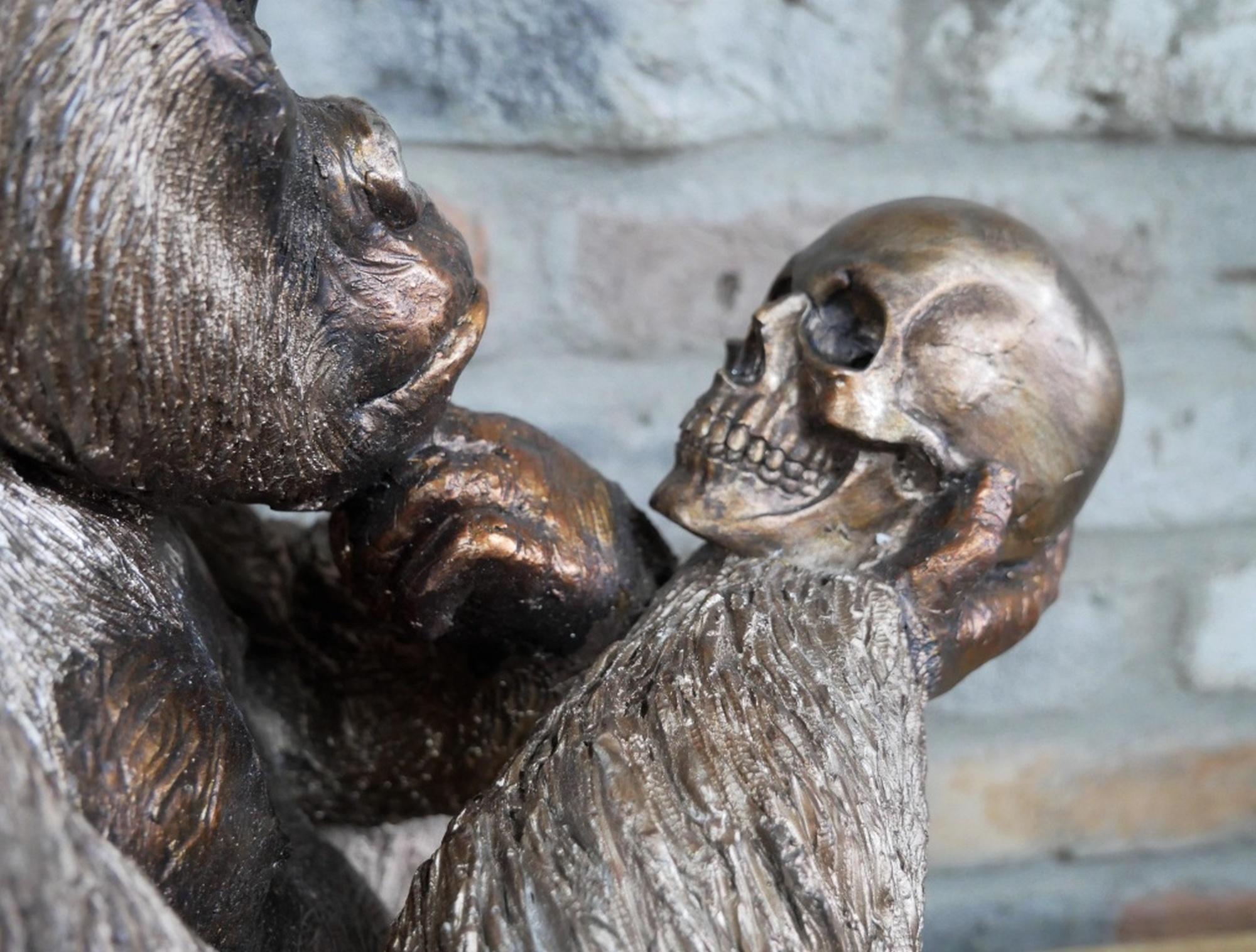 Product photograph of Large Gorilla Statue Holding Skull Ornament from Choice Furniture Superstore.