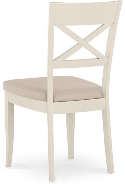 Product photograph of Bentley Designs Montreux Antique White And Ivory Bonded Leather Dining Chair - Sold In Pairs from Choice Furniture Superstore.