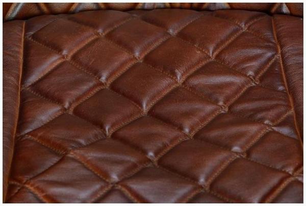 Product photograph of Camanche Brown Leather Upholstered Tub Armchair from Choice Furniture Superstore.