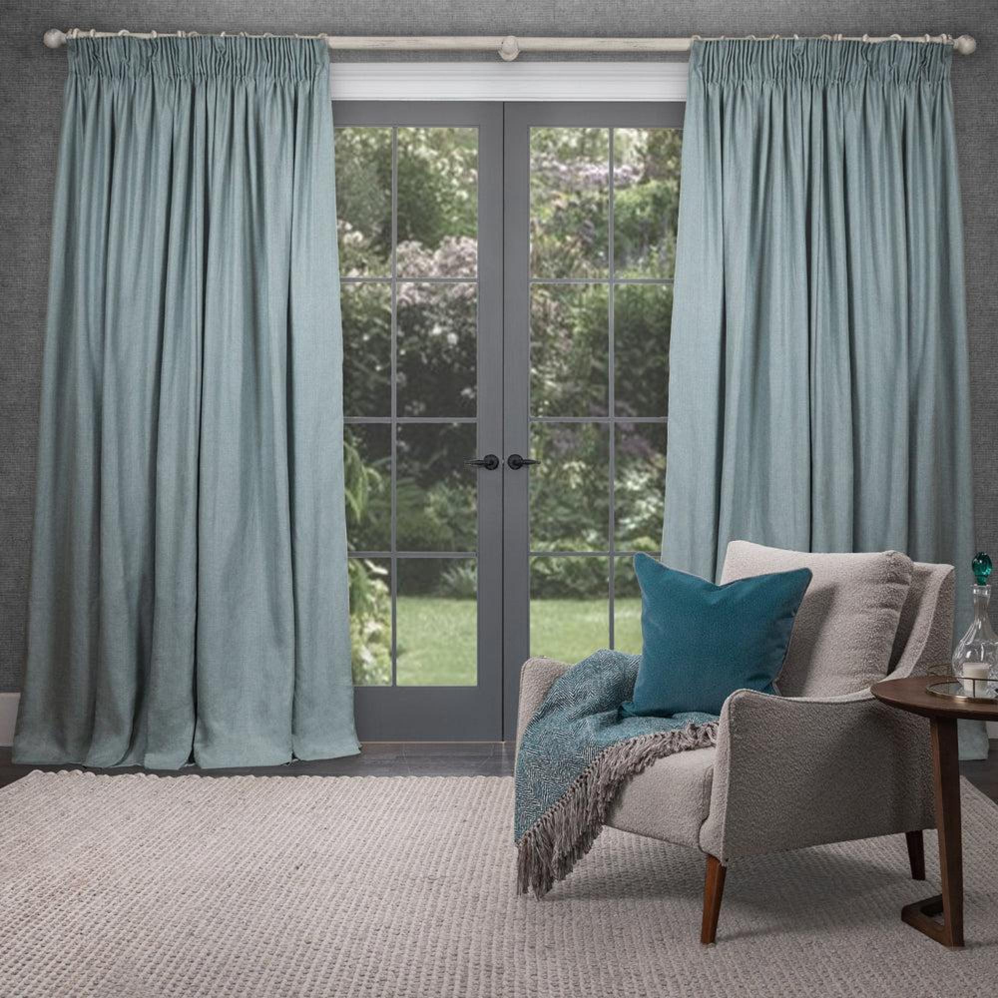 Product photograph of Voyage Maison Duck Egg Polyester Emilio Woven Pencil Pleat Curtains from Choice Furniture Superstore.