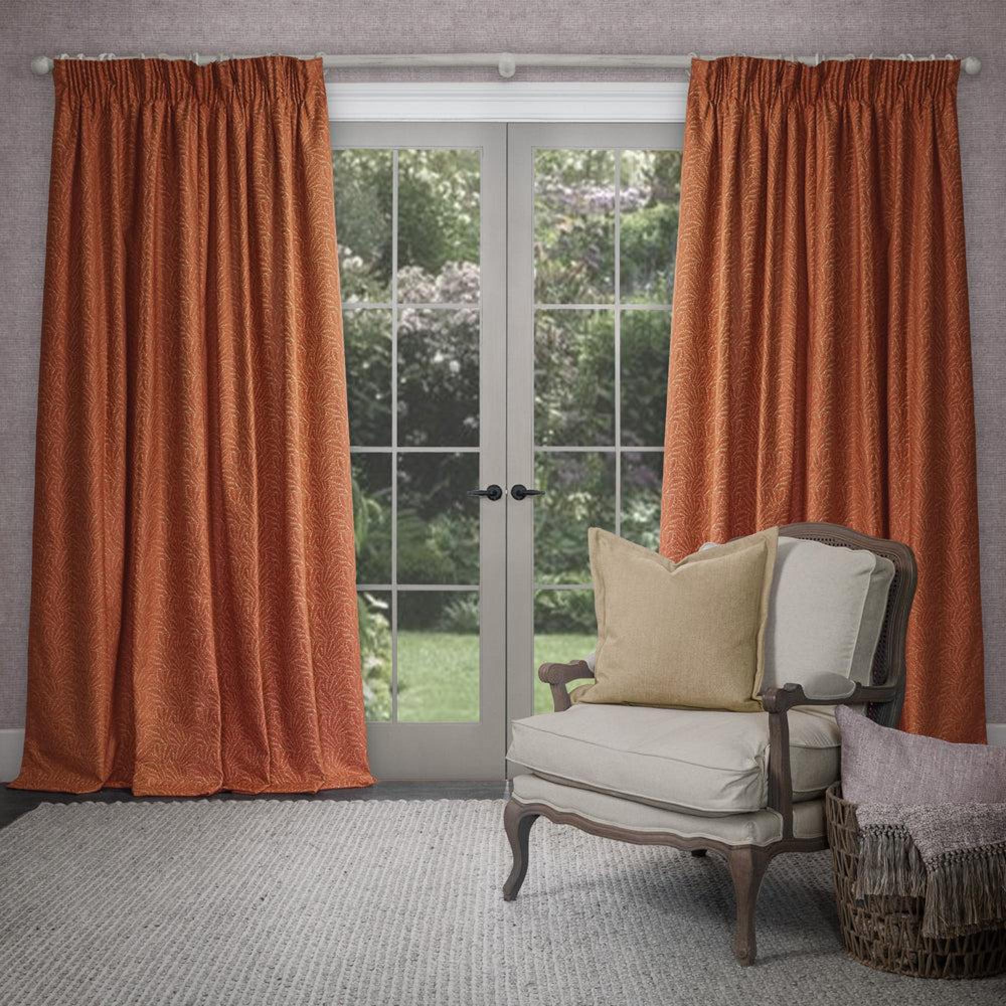 Product photograph of Voyage Maison Rust Viscose Farley Woven Pencil Pleat Curtains from Choice Furniture Superstore.