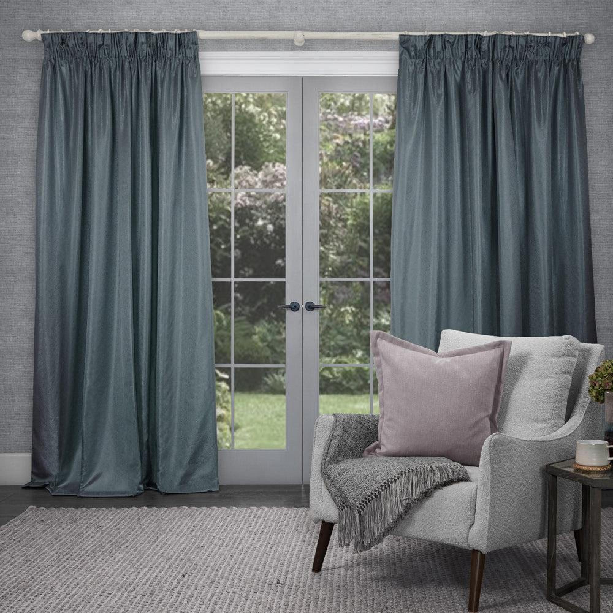 Product photograph of Voyage Maison Teal Polyester Sereno Woven Pencil Pleat Curtains from Choice Furniture Superstore.
