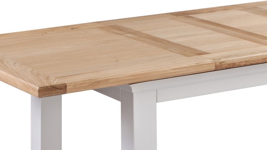 Product photograph of Homestyle Gb Cotswold Oak And Painted Extending Dining Table from Choice Furniture Superstore.