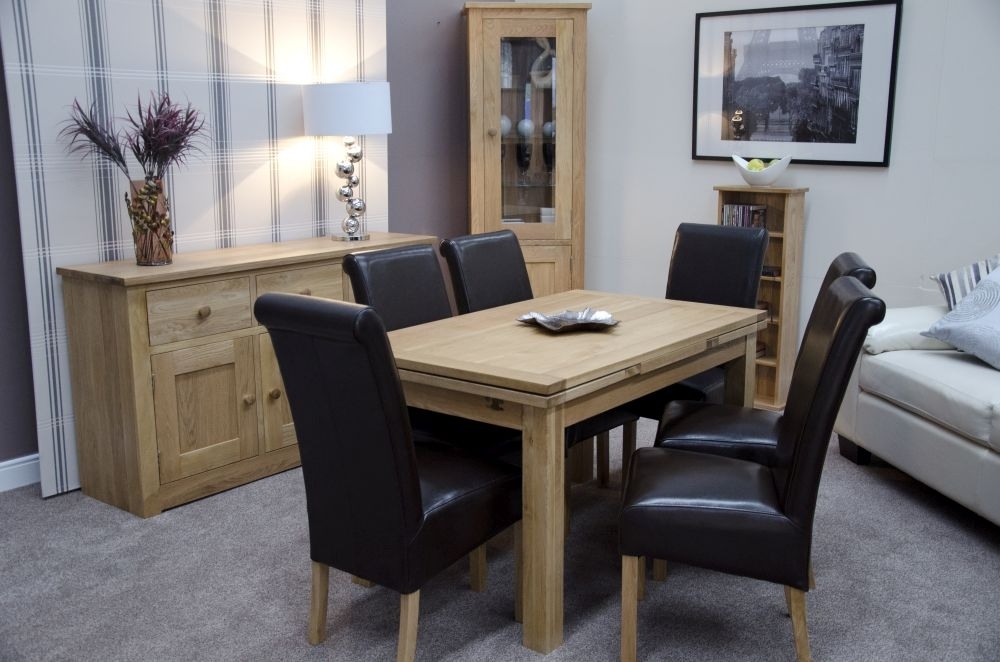 Product photograph of Homestyle Gb Elegance Oak 4 Seater Extending Dining Table from Choice Furniture Superstore.