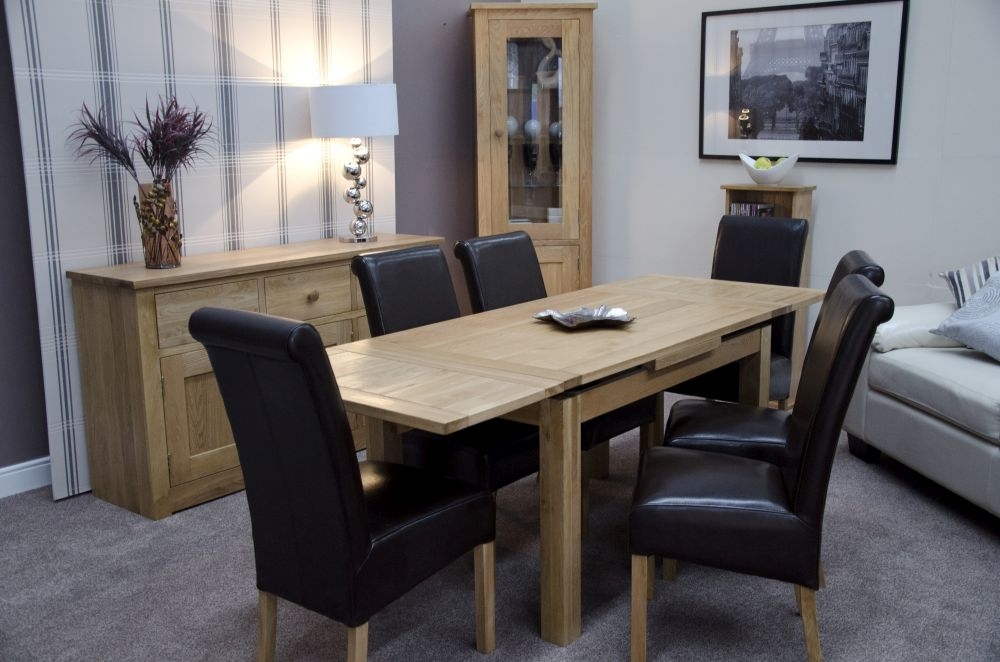 Product photograph of Homestyle Gb Elegance Oak 4 Seater Extending Dining Table from Choice Furniture Superstore.