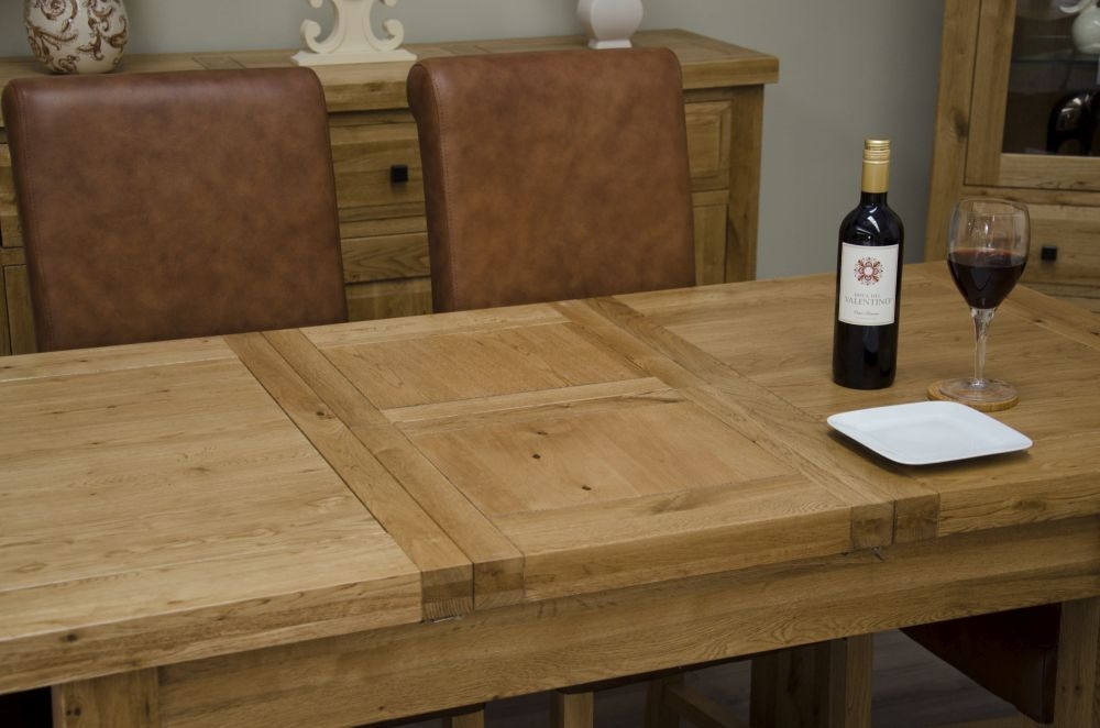 Product photograph of Homestyle Gb Deluxe Oak Butterfly Extending Dining Table from Choice Furniture Superstore.