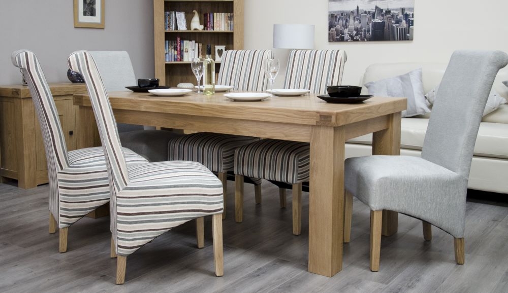 Product photograph of Homestyle Gb Bordeaux Oak Dining Table from Choice Furniture Superstore.