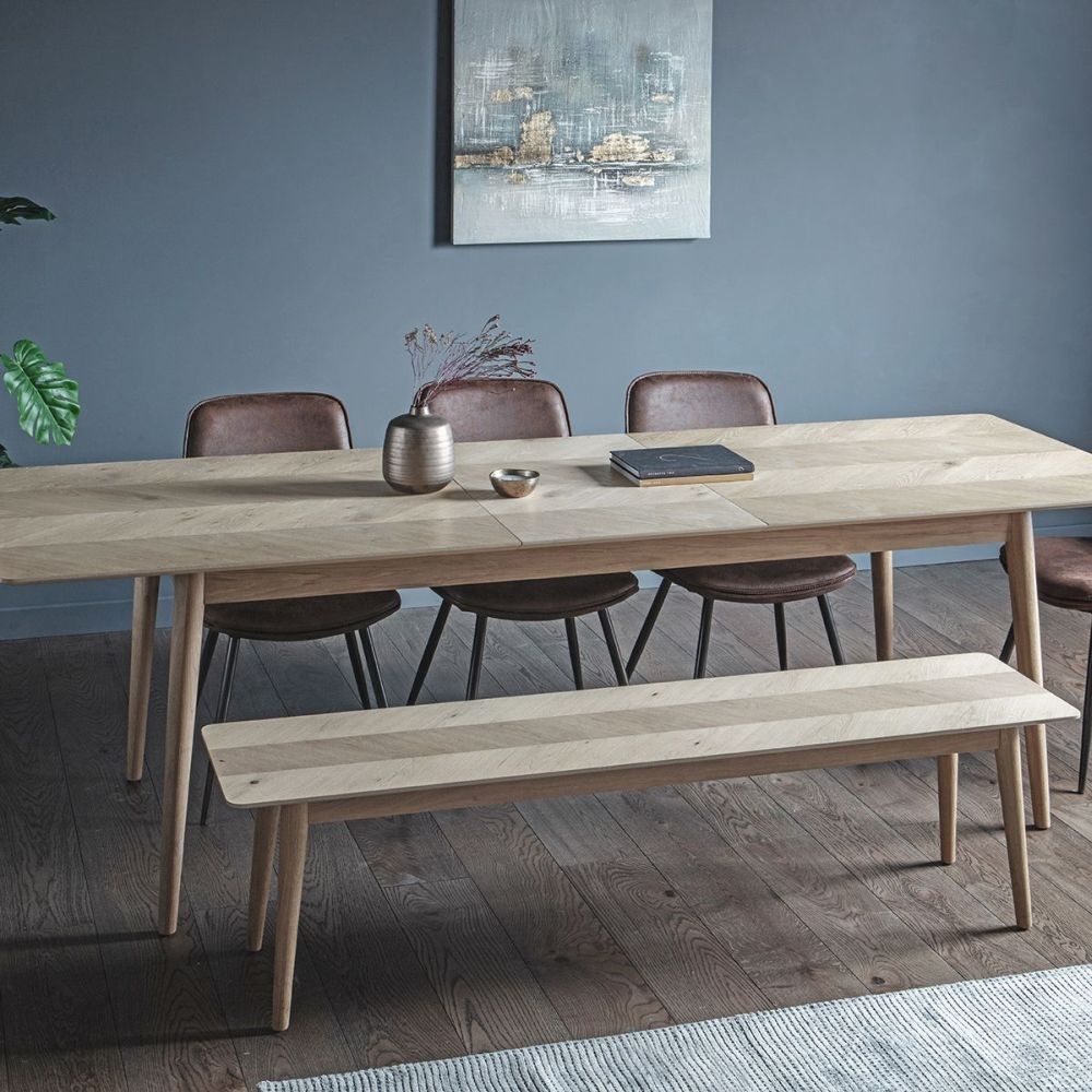 Product photograph of Milano Chevron Oak 8 Seater Extending Dining Table from Choice Furniture Superstore.