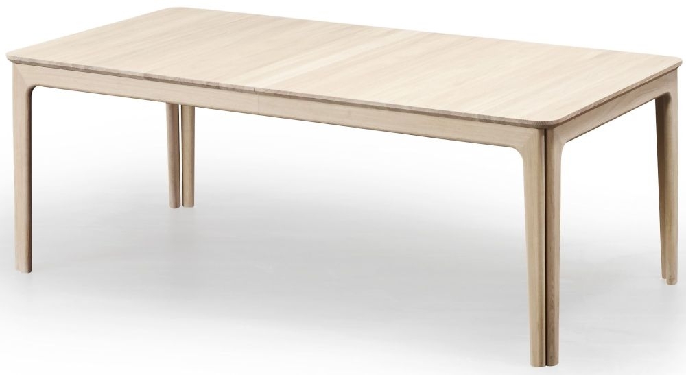 Product photograph of Skovby Sm27 8 To 20 Seater Extending Dining Table from Choice Furniture Superstore.