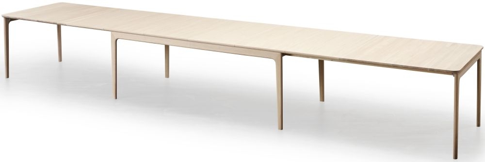 Product photograph of Skovby Sm27 8 Seater Extending Dining Table from Choice Furniture Superstore.